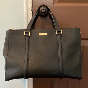 kate spade bag with shoulder strap. there are some scratches on the handles